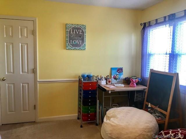 2802 Reece Drive Monroe, NC 28110 - Photo 17 of 37 a view of a workspace with furniture and a window