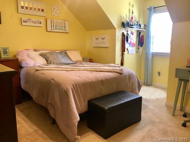 2802 Reece Drive Monroe, NC 28110 - Photo 19 of 37 a bedroom with a bed and window