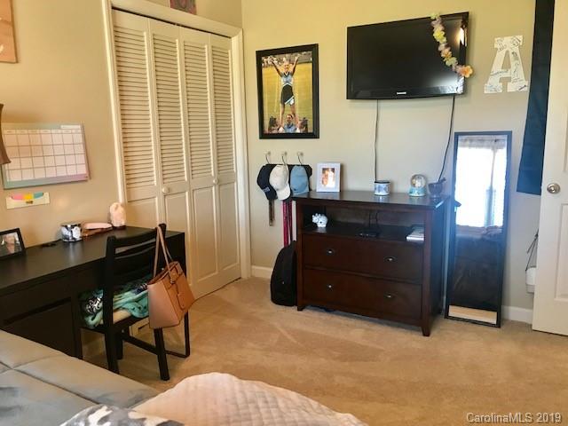 2802 Reece Drive Monroe, NC 28110 - Photo 22 of 37 a living room with furniture and a flat screen tv