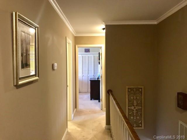 2802 Reece Drive Monroe, NC 28110 - Photo 25 of 37 a view of a hallway with wooden floor and entryway