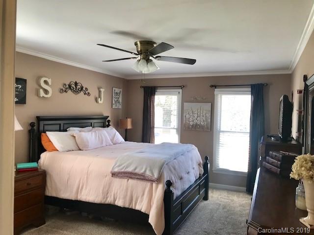 2802 Reece Drive Monroe, NC 28110 - Photo 27 of 37 a bedroom with a large bed and a window