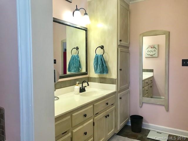 2802 Reece Drive Monroe, NC 28110 - Photo 30 of 37 a bathroom with a double vanity sink mirror and bathtub