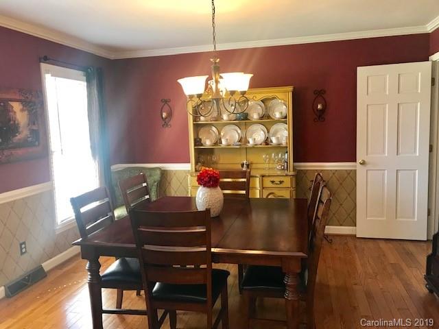 2802 Reece Drive Monroe, NC 28110 - Photo 4 of 37 a view of a dining room with furniture and wooden floor