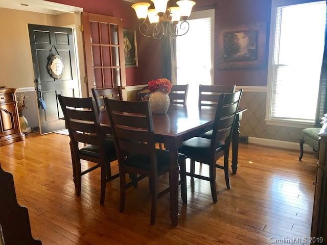 2802 Reece Drive Monroe, NC 28110 - Photo 6 of 37 a view of a dining room with furniture and wooden floor