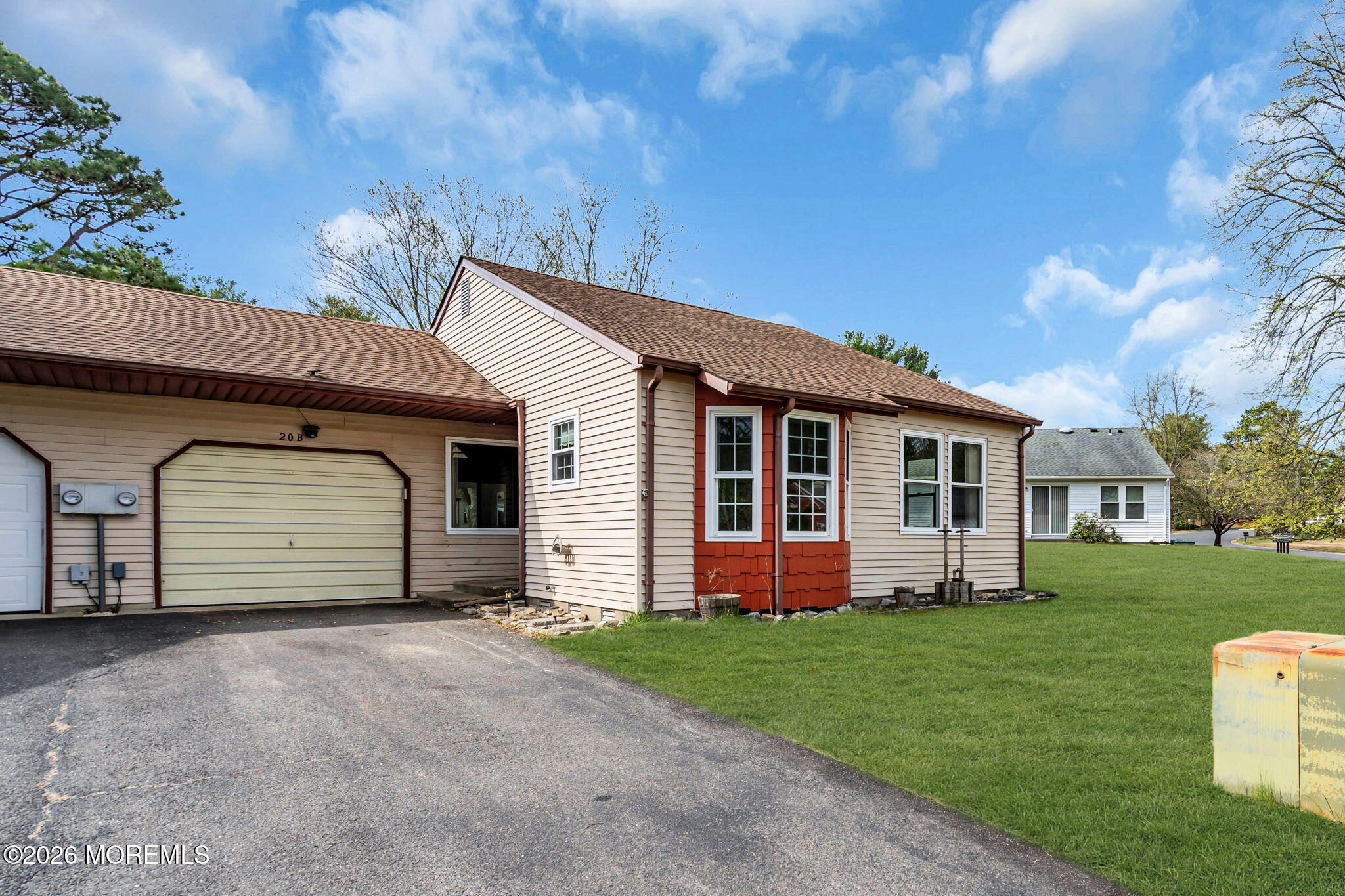 20B Amesbury Road, Unit B Whiting, NJ 08759 - Photo 23 of 25 a front view of house with yard