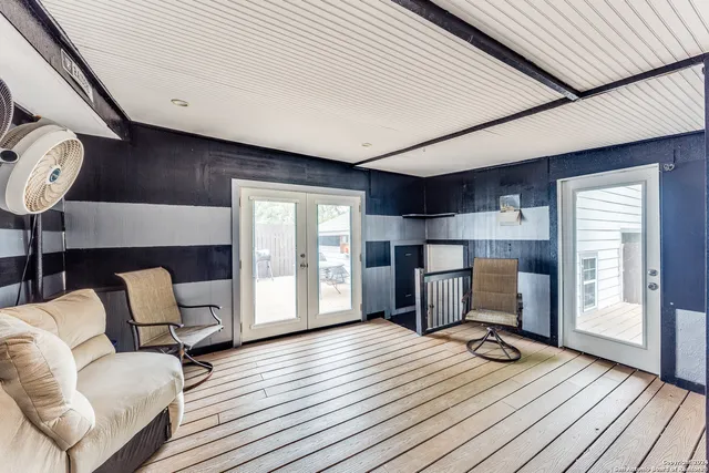 a view of a livingroom with furniture and wooden floor