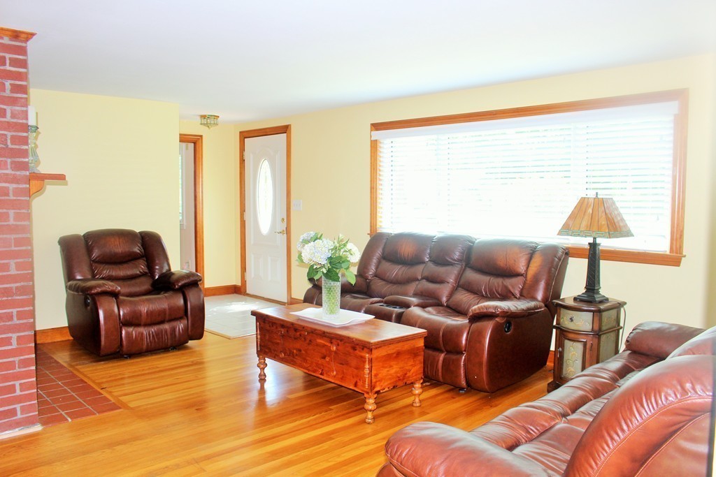 15 Alpine Road Norwood, MA 02062 - Photo 4 of 18 a living room with furniture wooden floor and a window