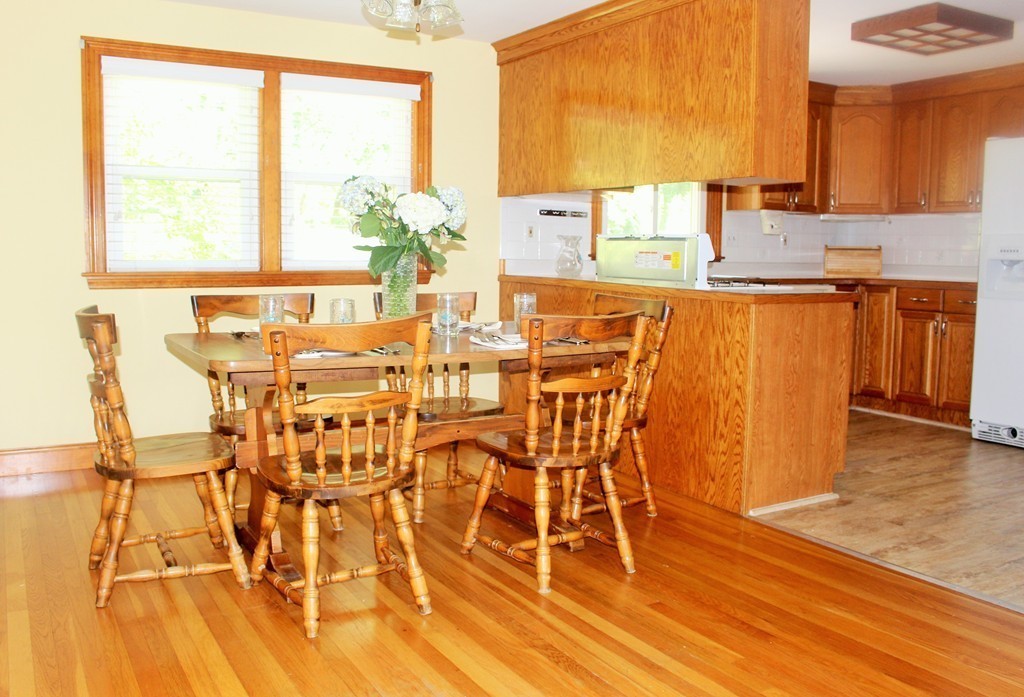 15 Alpine Road Norwood, MA 02062 - Photo 6 of 18 a dining room with furniture and wooden floor