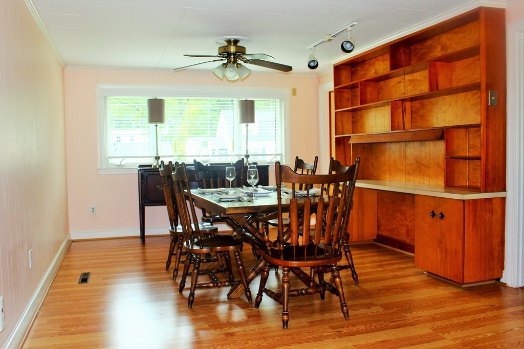 15 Alpine Road Norwood, MA 02062 - Photo 9 of 18 a view of a dining room with furniture and wooden floor