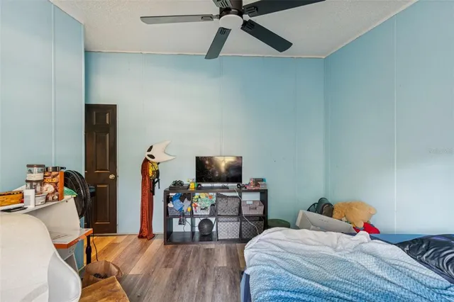 a bedroom with a bed and furniture