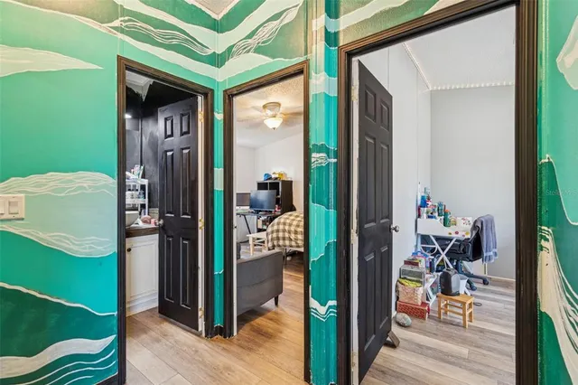a view of a livingroom with furniture and front door