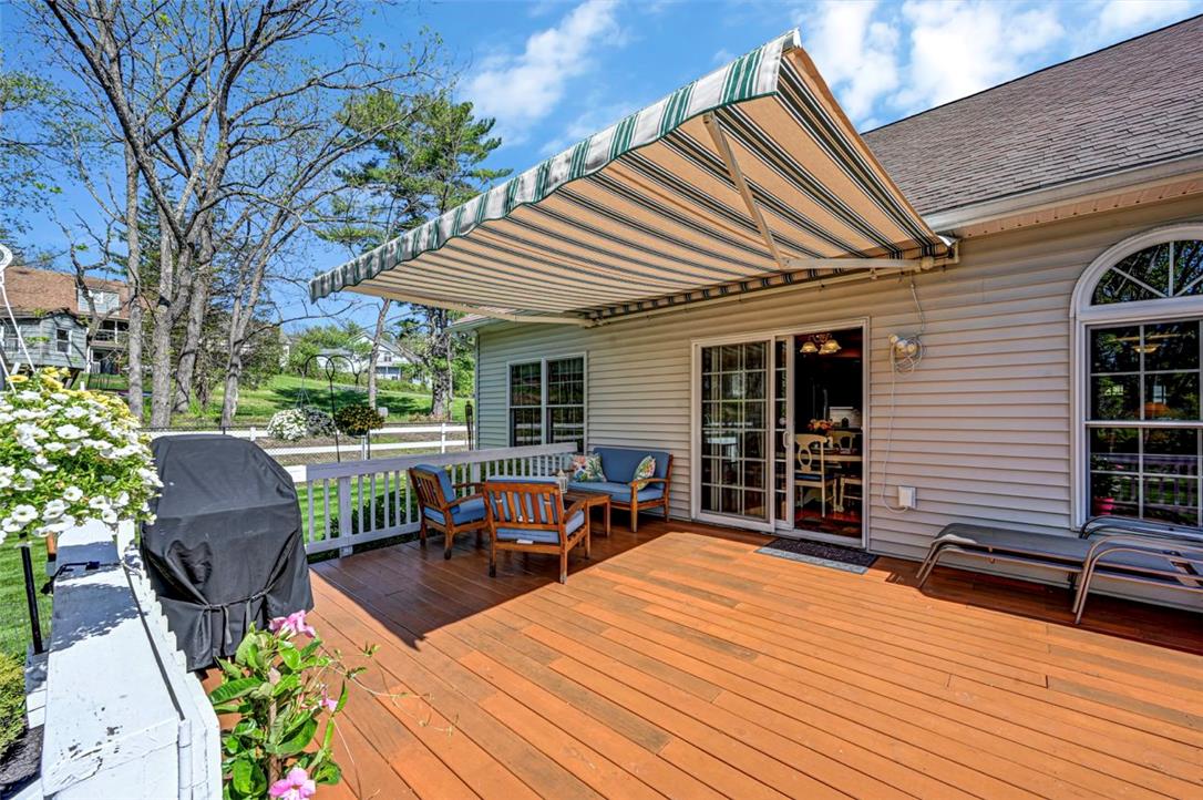 112 Michaels Run Road Stroudsburg, PA 18360 - Photo 55 of 69 Step outside on to the back deck and enjoy the sun or shade with the large retractable awning.
