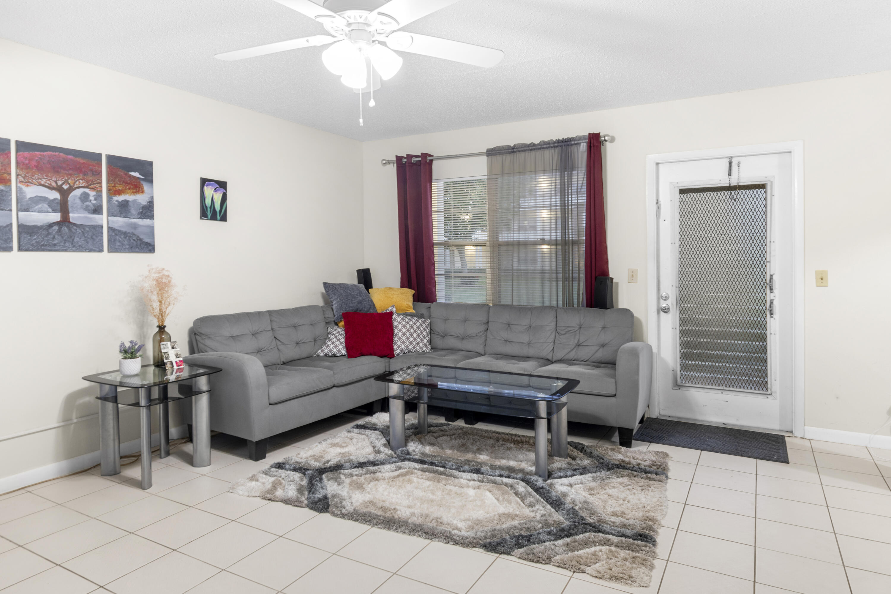 505 Mansfield M Boca Raton, FL 33434 - Photo 3 of 7 a living room with furniture and wooden floor