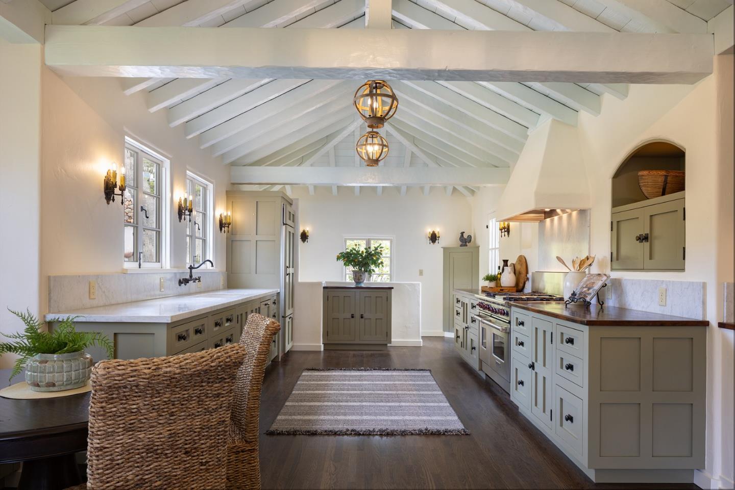 3269 Cabrillo Road Pebble Beach, CA 93953 - Photo 11 of 44 a kitchen with cabinets and window