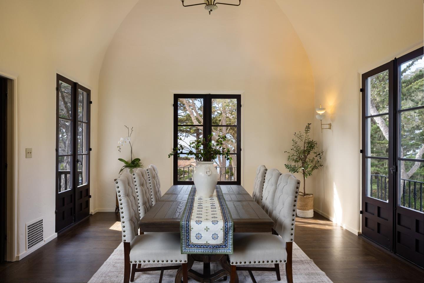 3269 Cabrillo Road Pebble Beach, CA 93953 - Photo 15 of 44 a view of a dining room with furniture and wooden floor