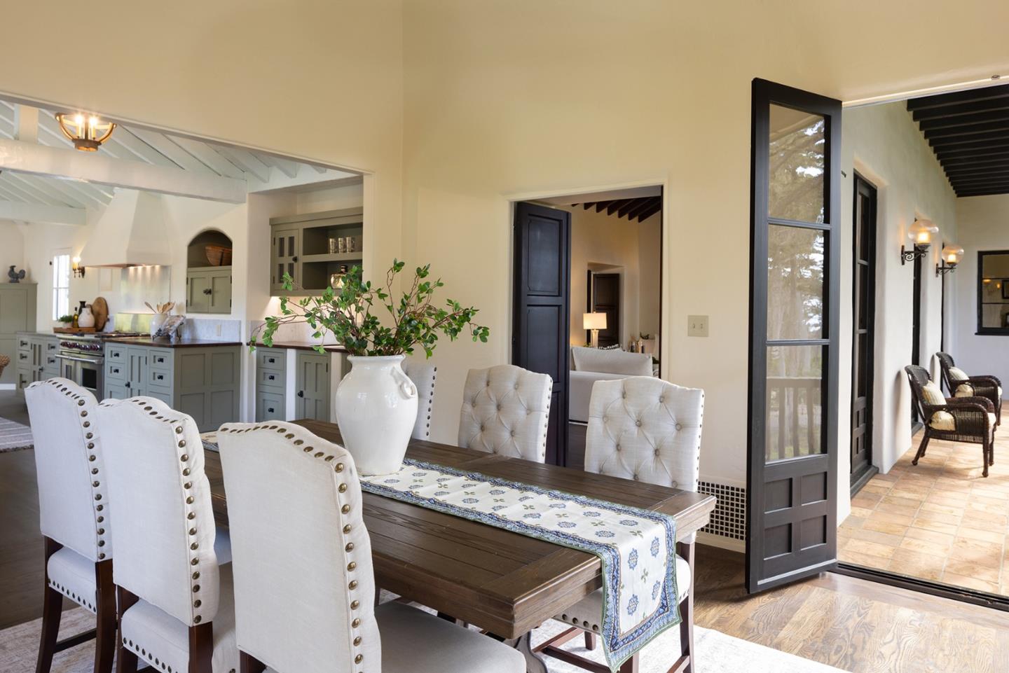 3269 Cabrillo Road Pebble Beach, CA 93953 - Photo 17 of 44 a view of a dining room with furniture and wooden floor