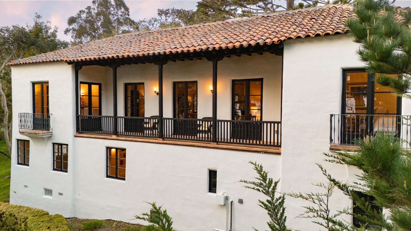 3269 Cabrillo Road Pebble Beach, CA 93953 - Photo 19 of 44 a view of a house with a potted plant