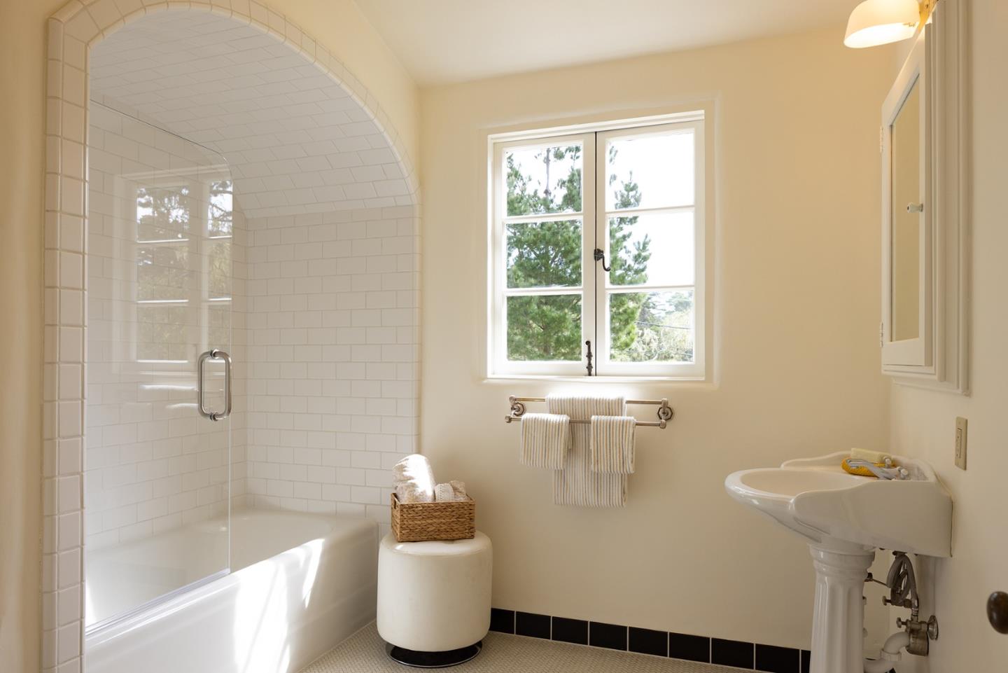 3269 Cabrillo Road Pebble Beach, CA 93953 - Photo 26 of 44 a bathroom with a bathtub and shower