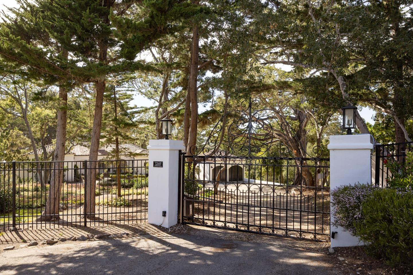 3269 Cabrillo Road Pebble Beach, CA 93953 - Photo 3 of 44 a front view of a house with a tree