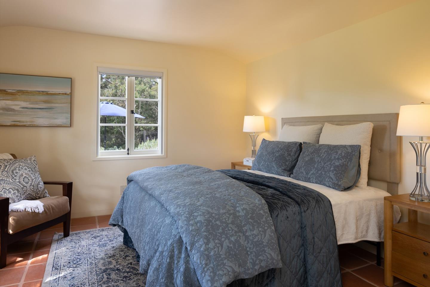 3269 Cabrillo Road Pebble Beach, CA 93953 - Photo 41 of 44 a bed room with a bed and a couch
