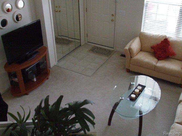 16978 Farmington Road, Unit 17 Livonia, MI 48154 - Photo 7 of 20 Dining Rm View to Liv. Rm