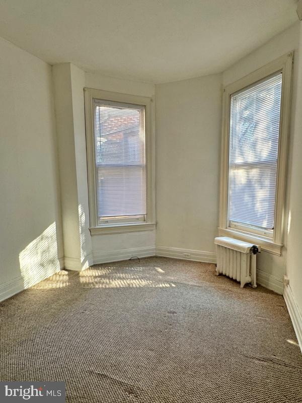 140 East Philadelphia Street, Unit 4 York, PA 17401 - Photo 4 of 5 a view of an empty room with a window