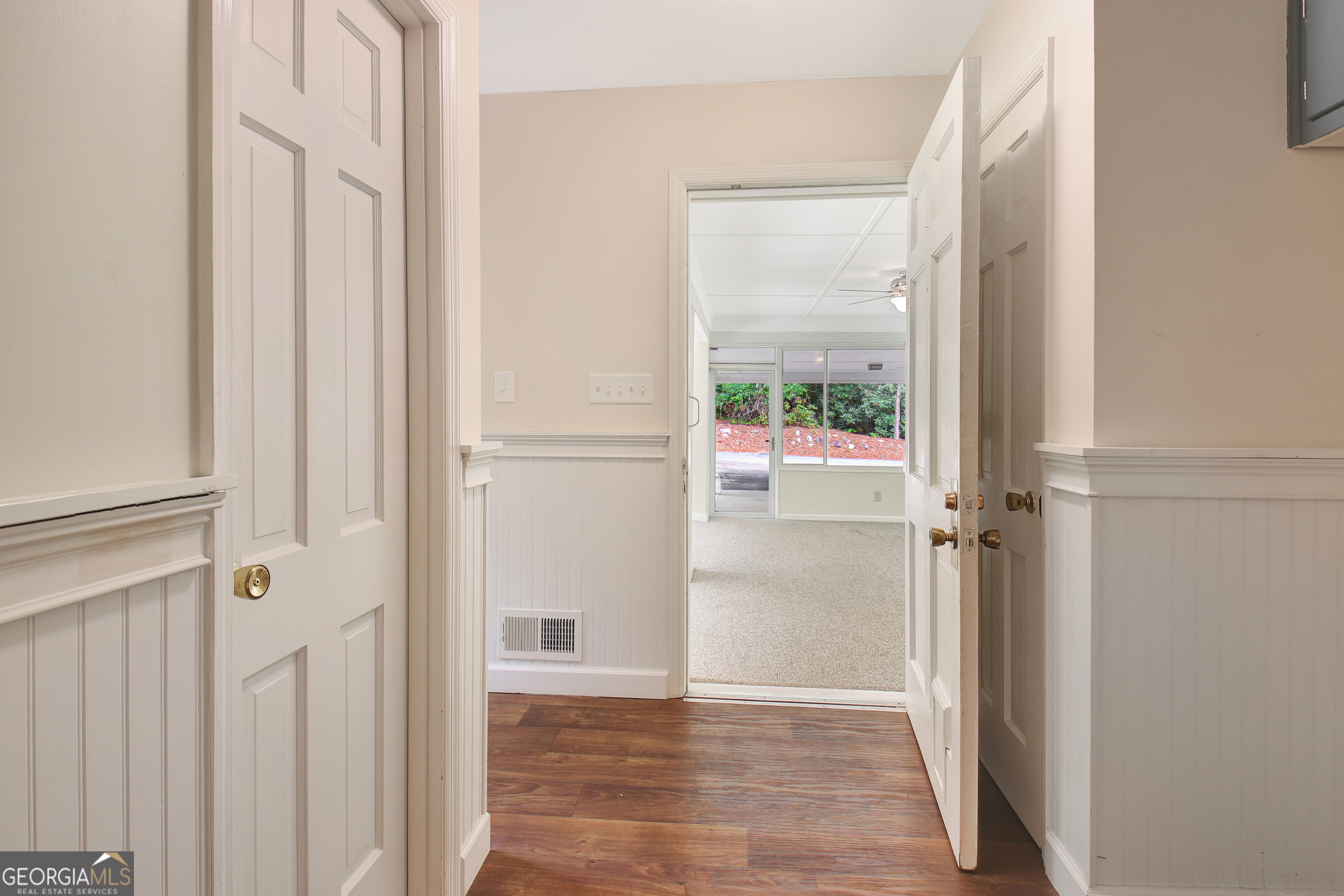 717 Tyrone Road Tyrone, GA 30290 - Photo 19 of 58 a view of a hallway with wooden floor