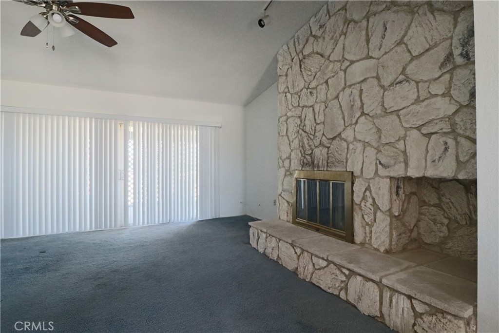 4752 Flying H Road Twentynine Palms, CA 92277 - Photo 14 of 55 a view of a livingroom with a staircase