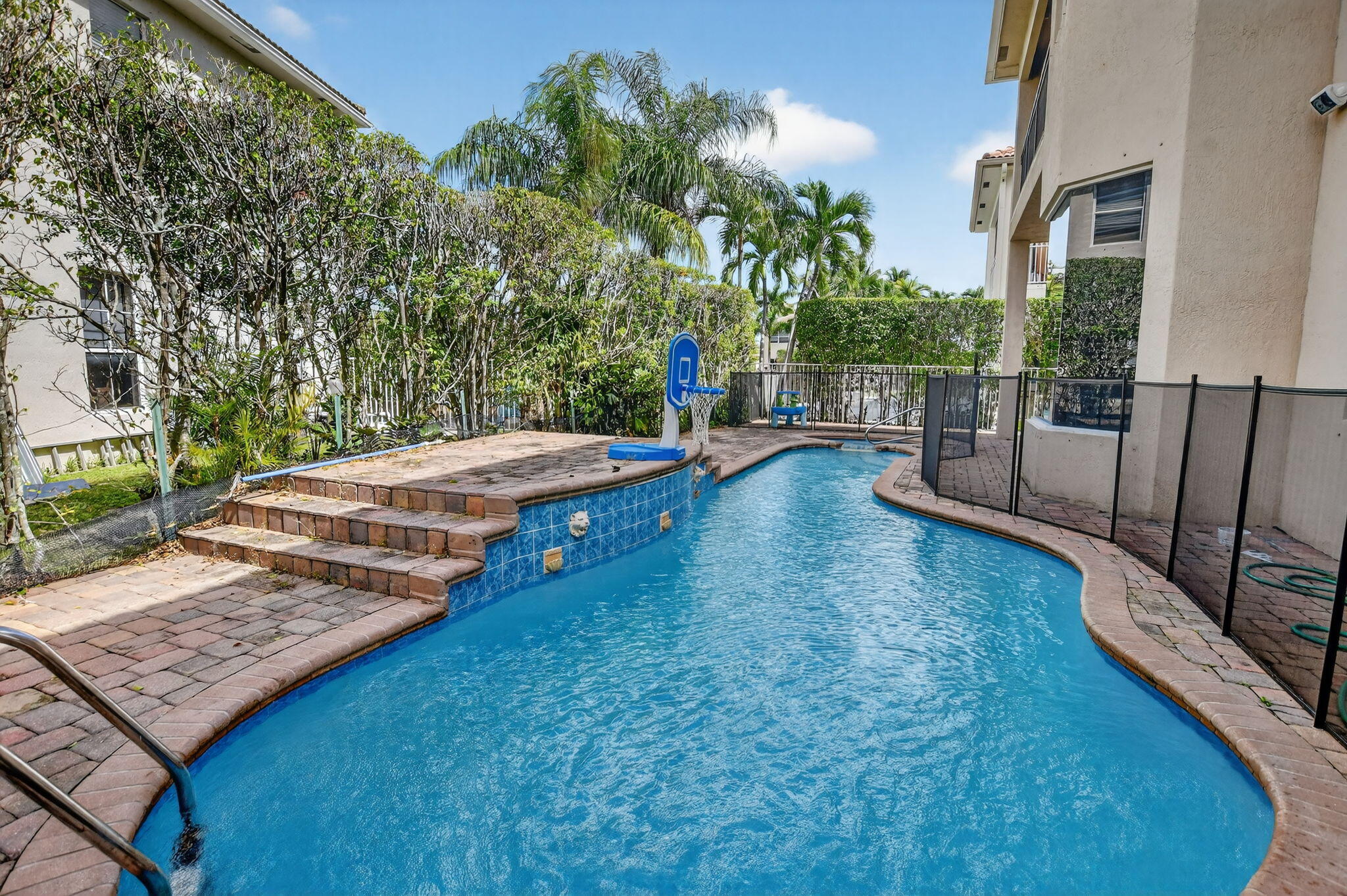 9833 Palma Vista Way Boca Raton, FL 33428 - Photo 24 of 45 a view of a backyard with sitting area