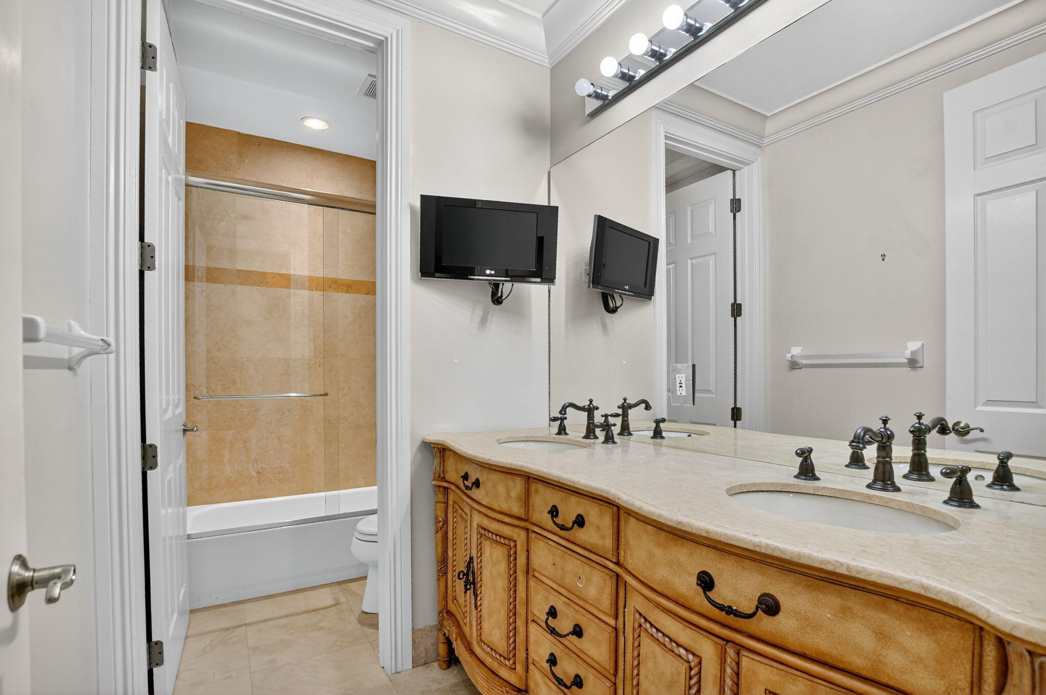 9833 Palma Vista Way Boca Raton, FL 33428 - Photo 39 of 45 a bathroom with a granite countertop sink mirror and shower