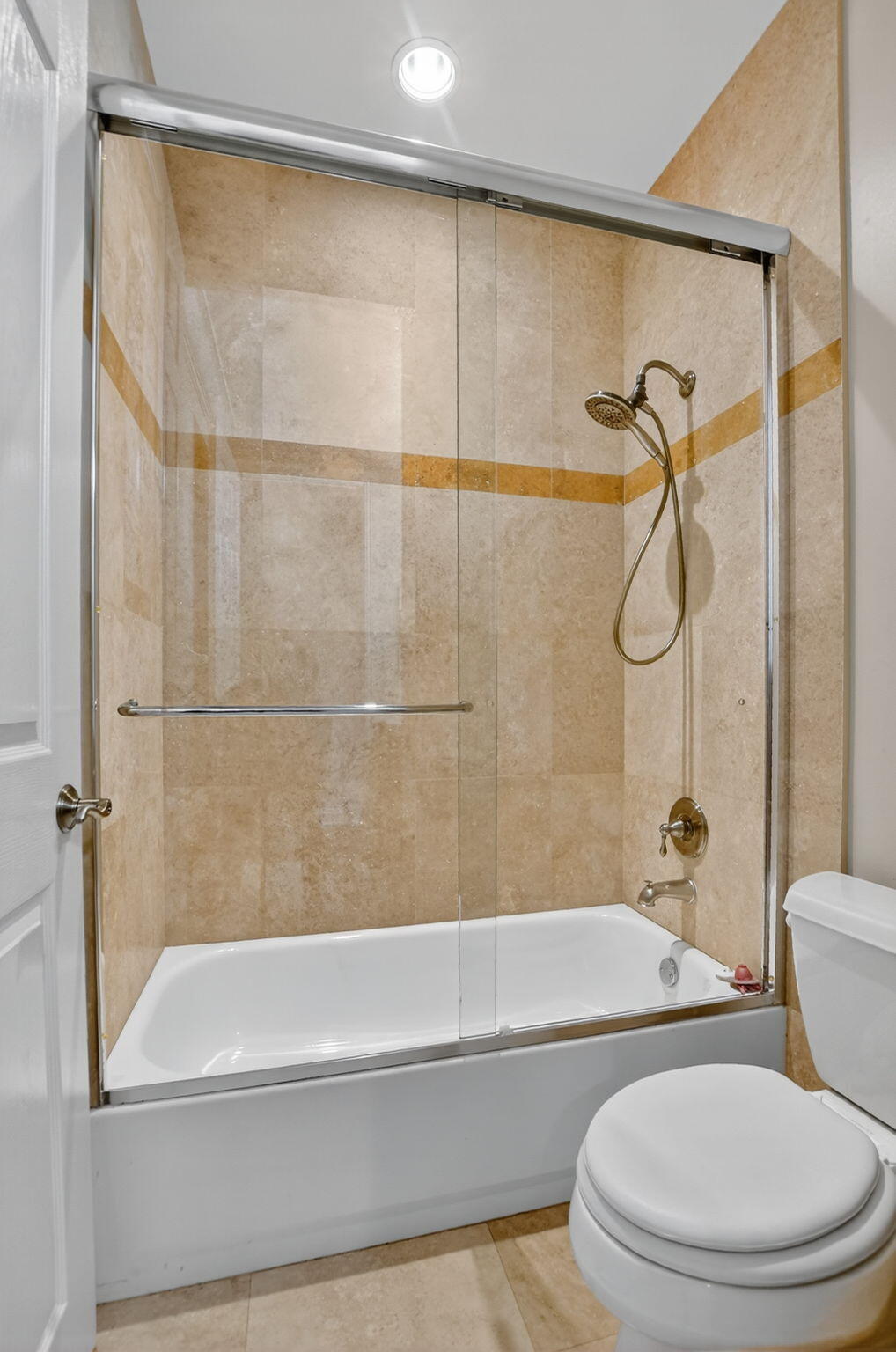 9833 Palma Vista Way Boca Raton, FL 33428 - Photo 40 of 45 a bathroom with a toilet and a bath tub