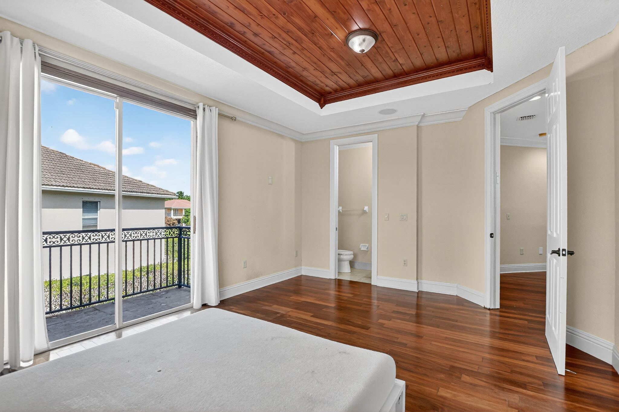 9833 Palma Vista Way Boca Raton, FL 33428 - Photo 41 of 45 a view of an empty room with wooden floor