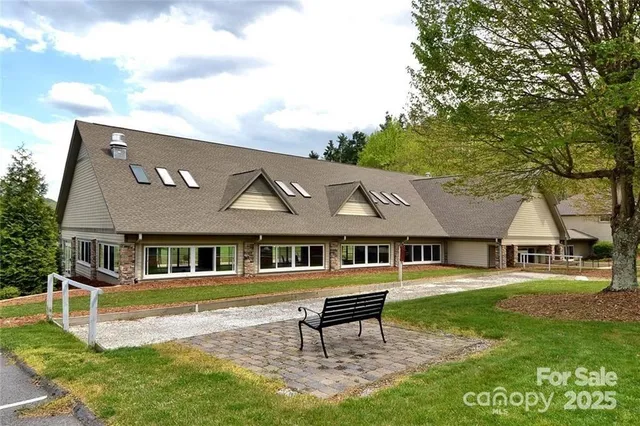 a view of a kitchen with granite countertop lots of counter top space