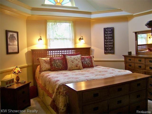 47200 West 11 Mile Road Novi, MI 48374 - Photo 36 of 62 1st FL Master BDRM, Crown Molding, Accent Lighting, Sky Lights, Stained Glass Accent Window