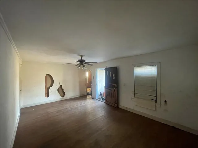 a view of a livingroom with a staircase