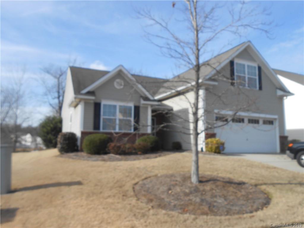 11605 Downy Birch Road Charlotte, NC 28227 - Photo 2 of 21 a front view of a house with a yard