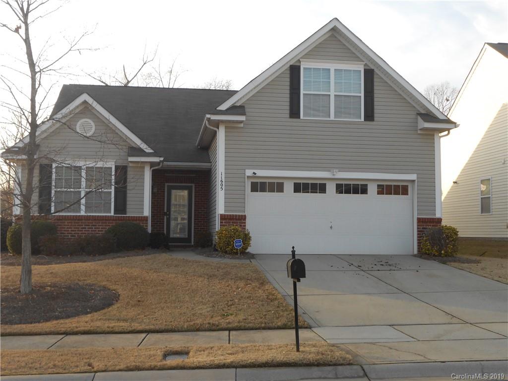 11605 Downy Birch Road Charlotte, NC 28227 - Photo 3 of 21 a front view of a house with garden
