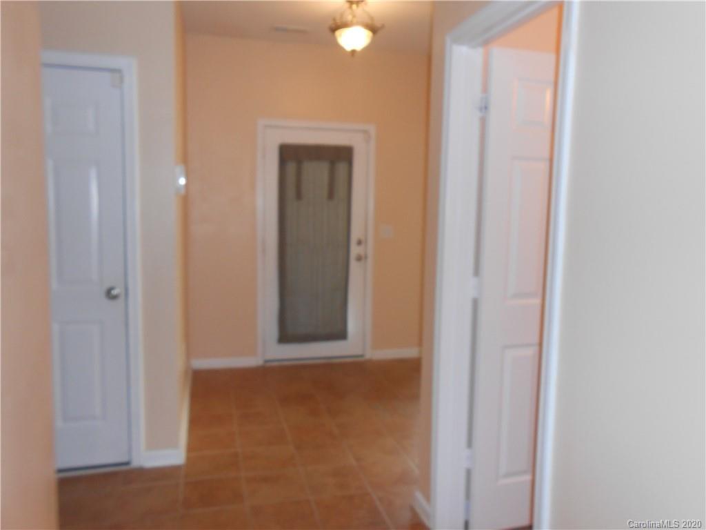 11605 Downy Birch Road Charlotte, NC 28227 - Photo 6 of 21 a view of an empty room and bathroom