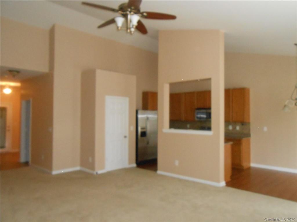 11605 Downy Birch Road Charlotte, NC 28227 - Photo 9 of 21 a view of empty room with a fan