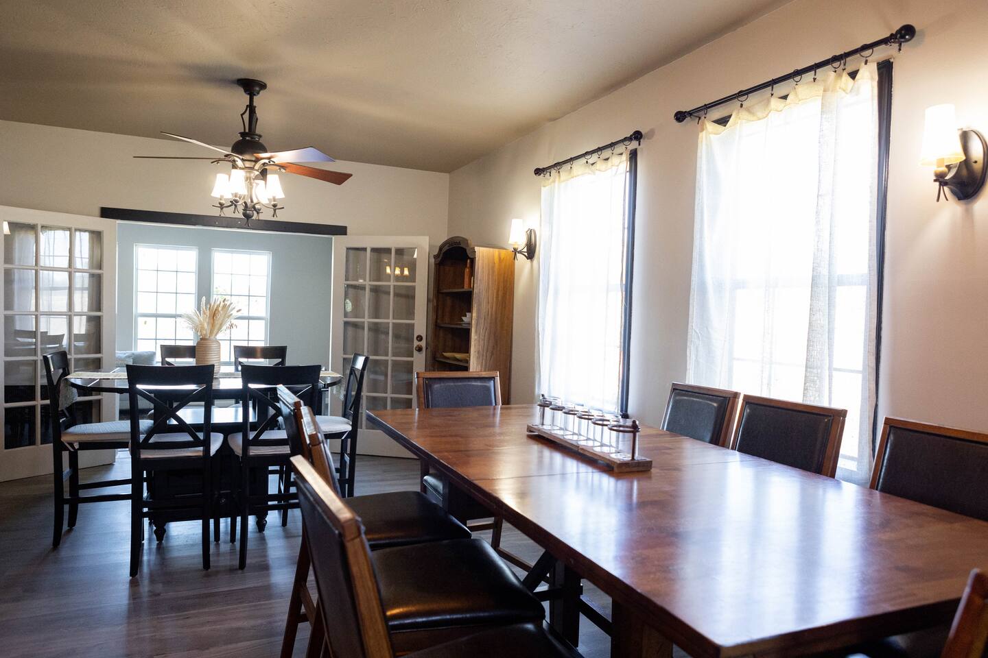 1901 Harmon Hills Road Dripping Springs, TX 78620 - Photo 3 of 27 a view of a dining room with furniture window and wooden floor