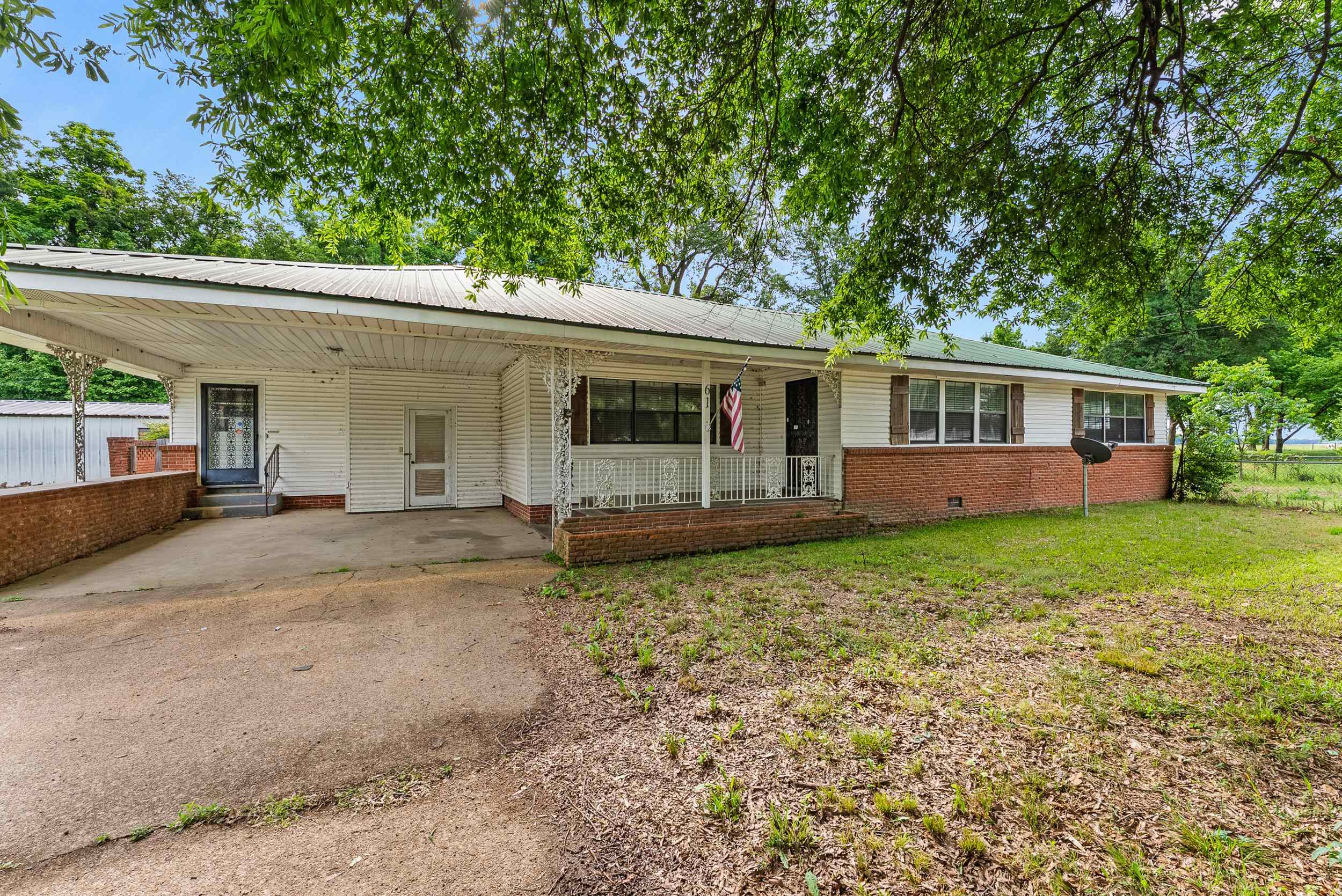 61 Bridge Road Coahoma, MS 38617 - Photo 1 of 27 a view of a house with backyard and garden