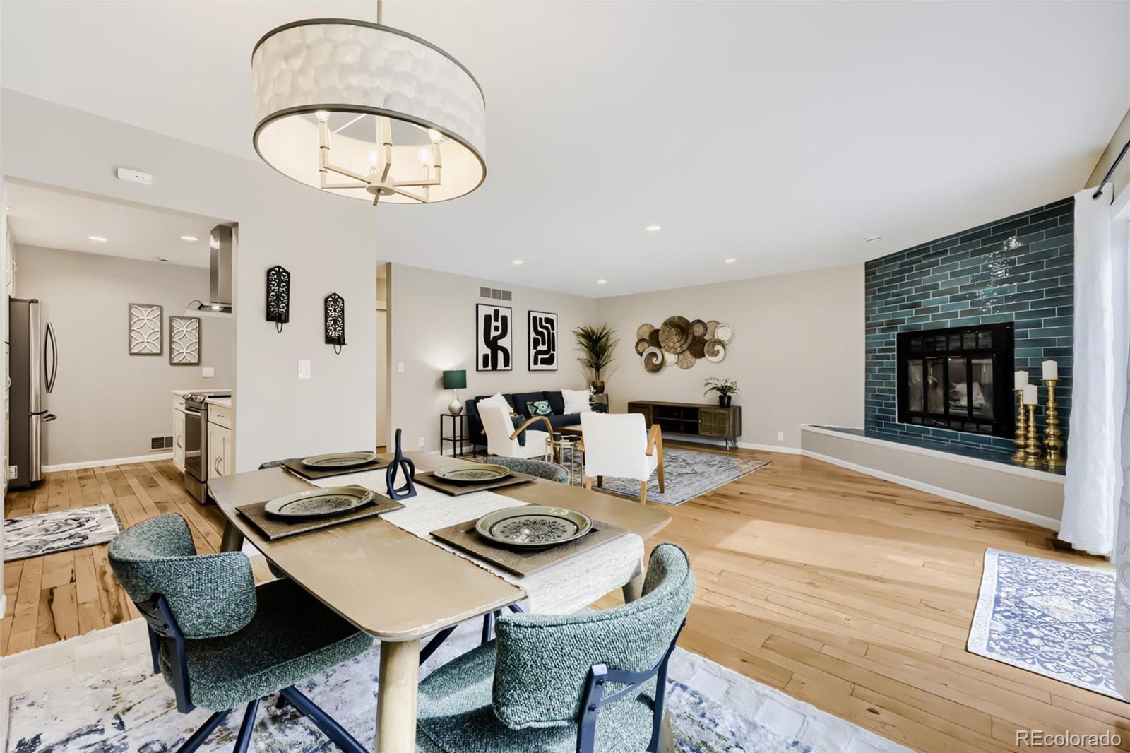175 Xenon Street Denver, CO 80228 - Photo 12 of 37 a view of a dining room with furniture