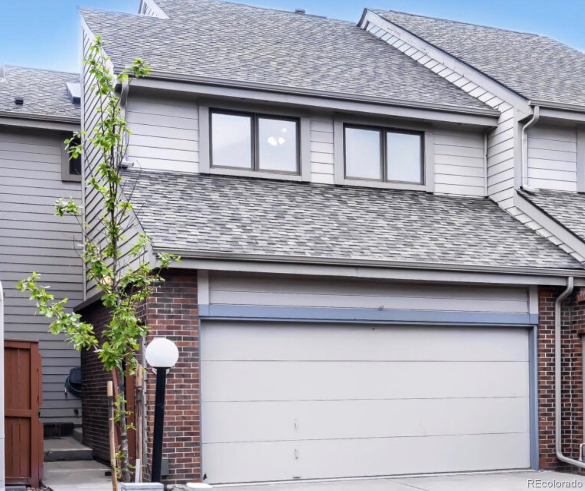 175 Xenon Street Denver, CO 80228 - Photo 2 of 37 a front view of a house with plants