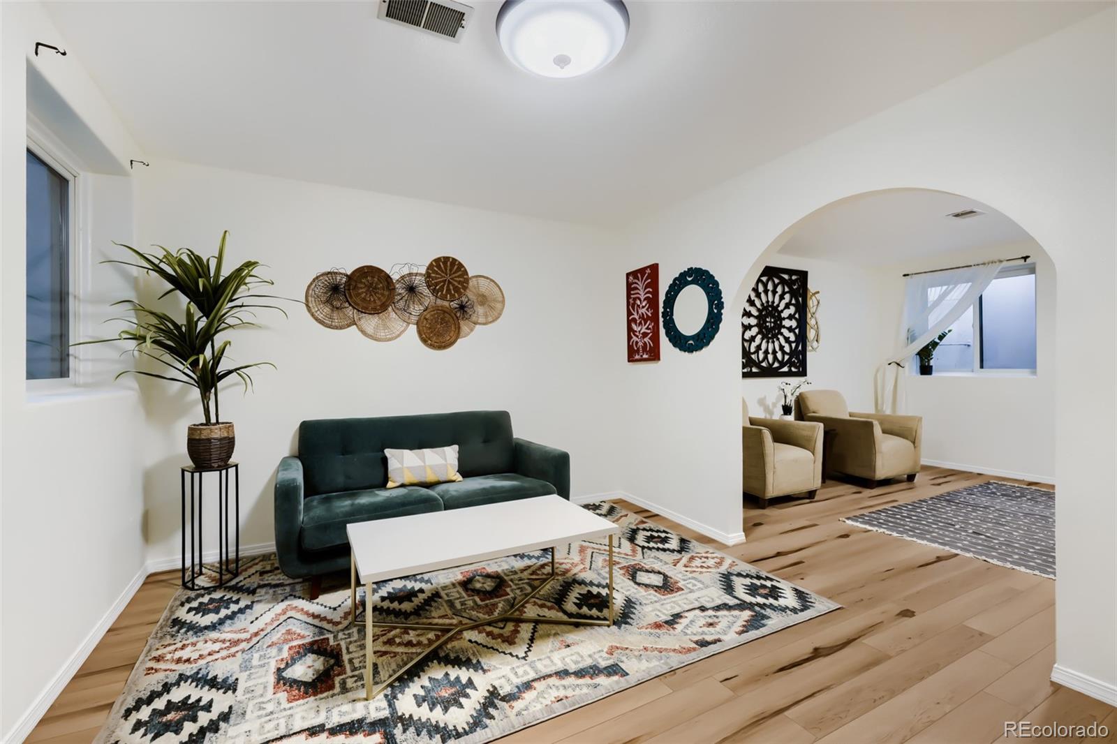 175 Xenon Street Denver, CO 80228 - Photo 21 of 37 a bedroom with a bed and furniture