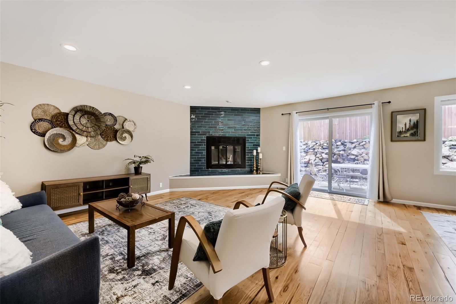175 Xenon Street Denver, CO 80228 - Photo 5 of 37 a view of a dining room with furniture window and wooden floor