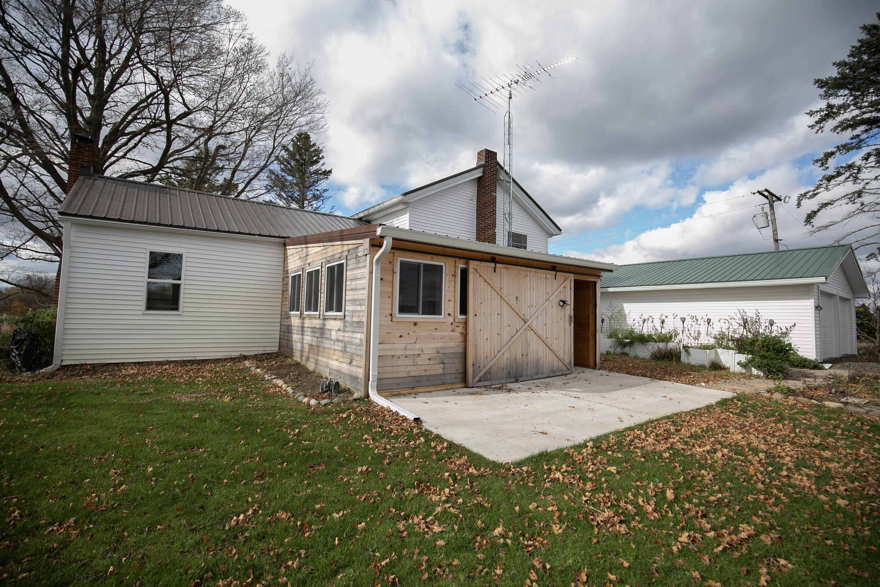 8950 North Fowlerville Road Fowlerville, MI 48836 - Photo 1 of 1 Back of Home