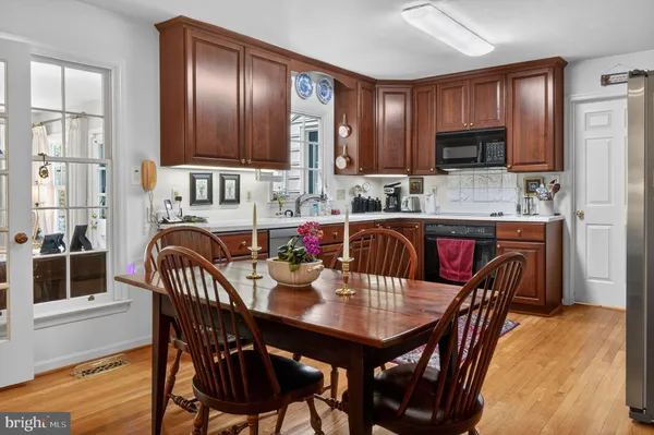 a view of a dining room with furniture