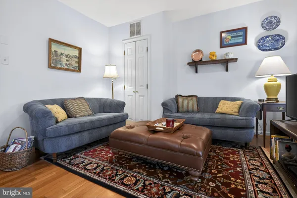 a living room with furniture and a couch