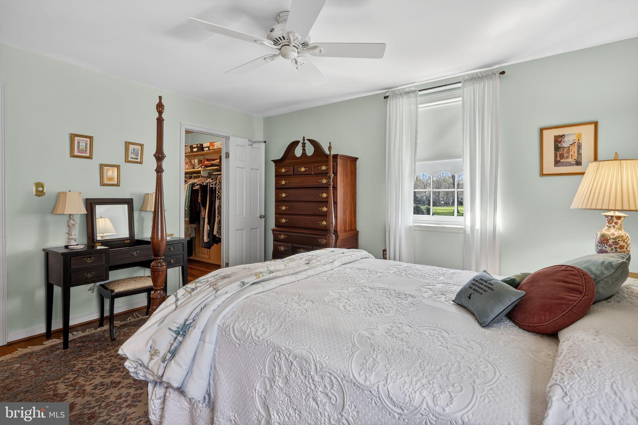 1510 Eton Way Crofton, MD 21114 - Photo 29 of 51 a bedroom with a bed and dresser with chair