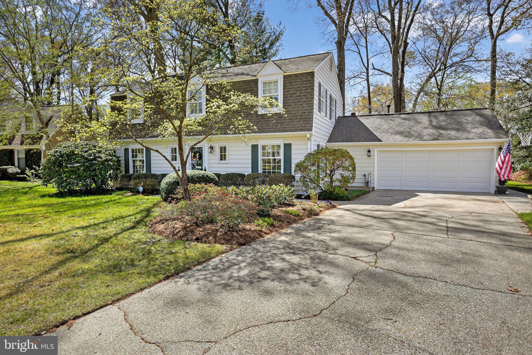 1510 Eton Way Crofton, MD 21114 - Photo 3 of 51 a front view of a house with a garden